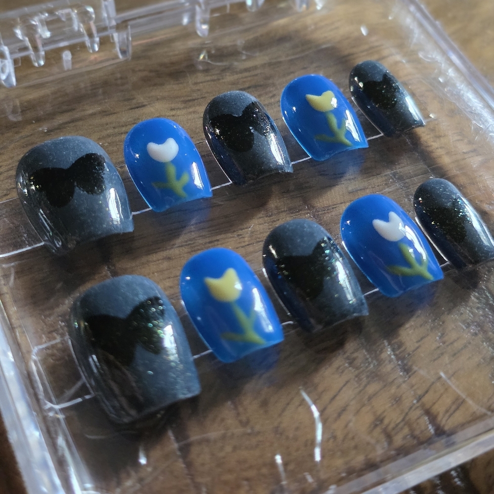 36. Blue and Black Floral Press-On Nails